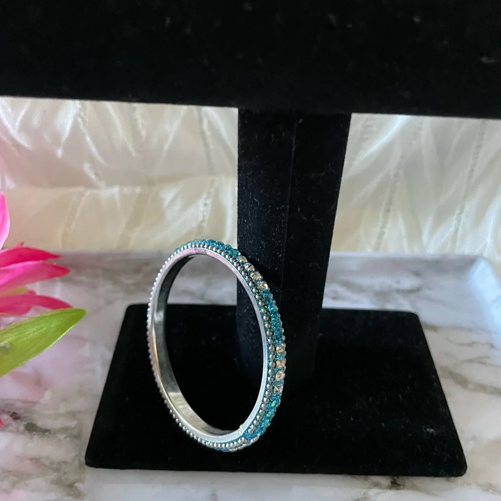 Blue and clear rhinestone silver tone bangle